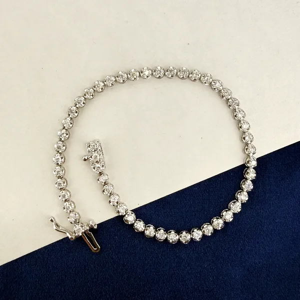 18ct White Gold Illusion Set Diamond Tennis Bracelet - 1.06cts — image 2